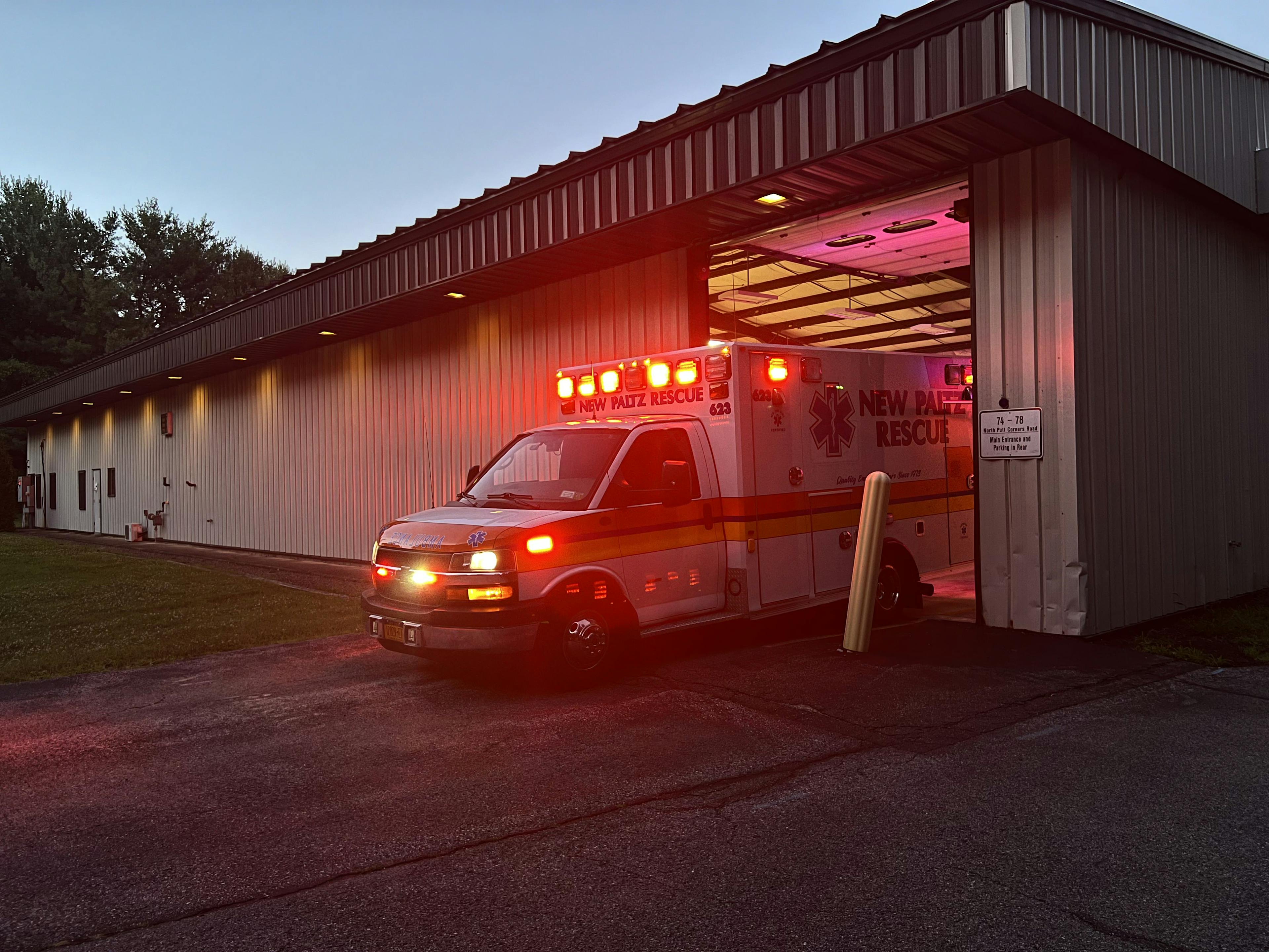 Ambulance leaving garage